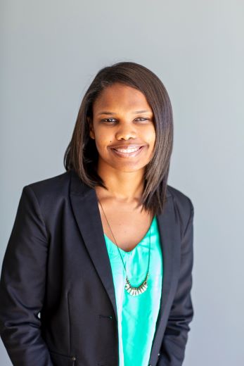 A smiling portrait of Elizabeth Lizzy Muhammad-Park